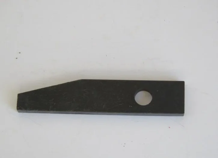 A black metal object with one hole in it.