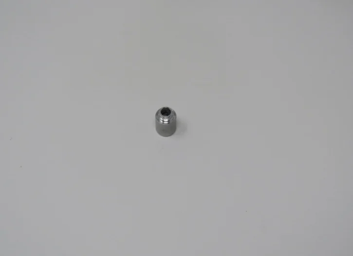 A metal bead is shown on the wall.