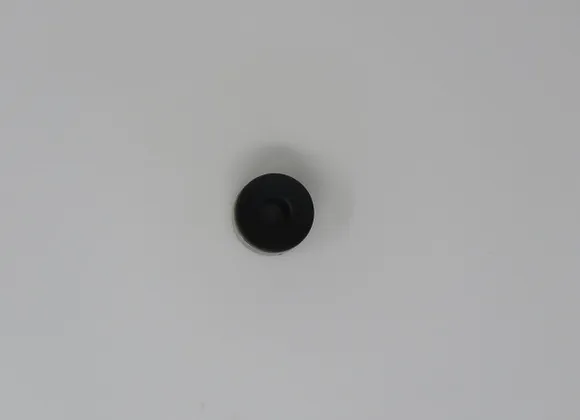 A black object is seen in the air.