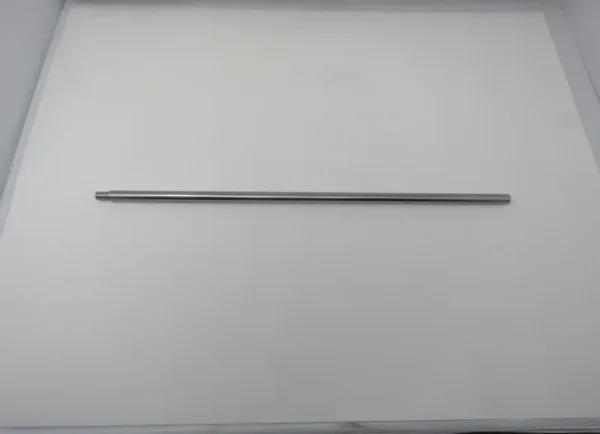 A metal rod is hanging on the wall.