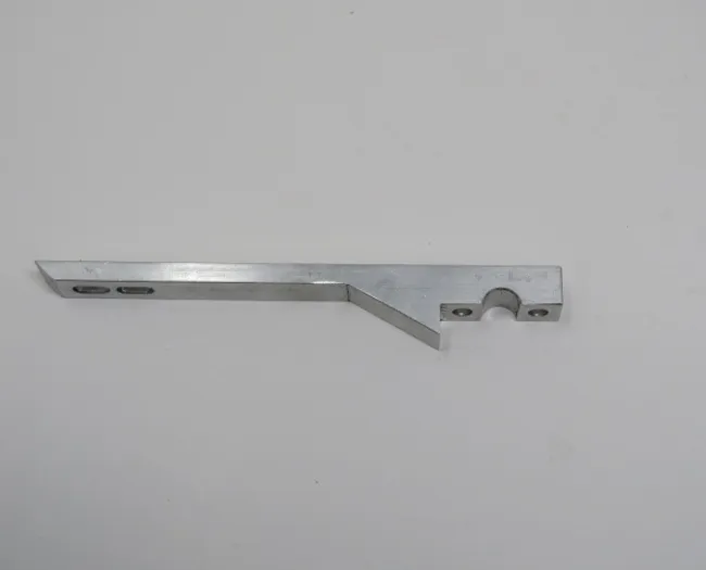 A metal bar with one end missing.