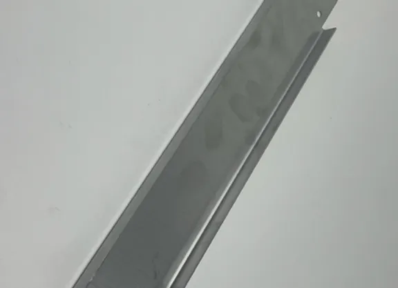 A metal strip with holes in it