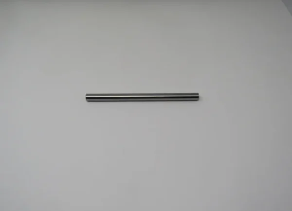 A metal rod hanging on the wall.