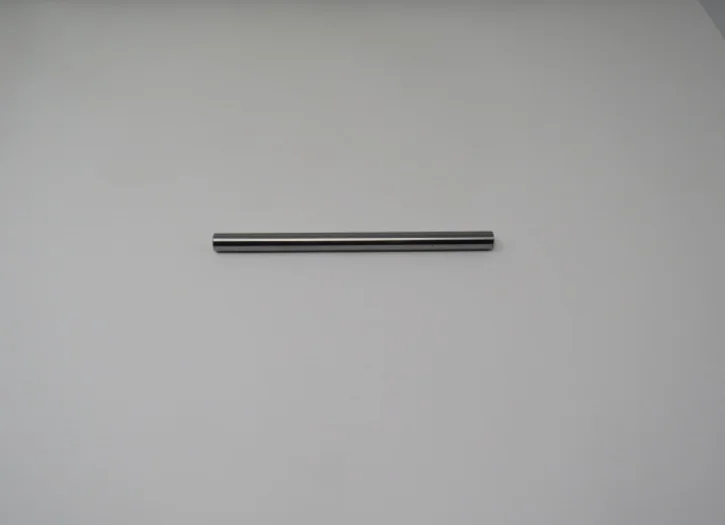 A metal rod hanging on the wall.