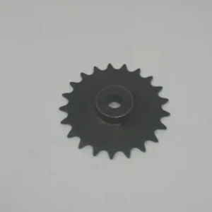 A black plastic gear with a hole in it.