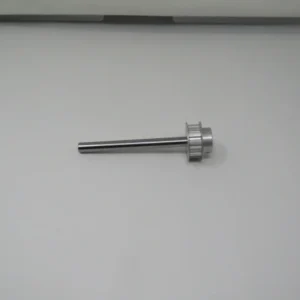 A metal object sitting on top of a table.