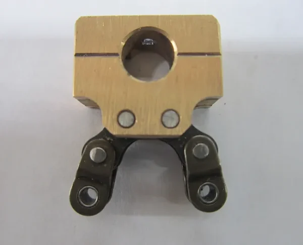 A picture of the front end of a bicycle chain tensioner.