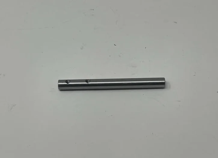 A metal rod with two ends attached to it.