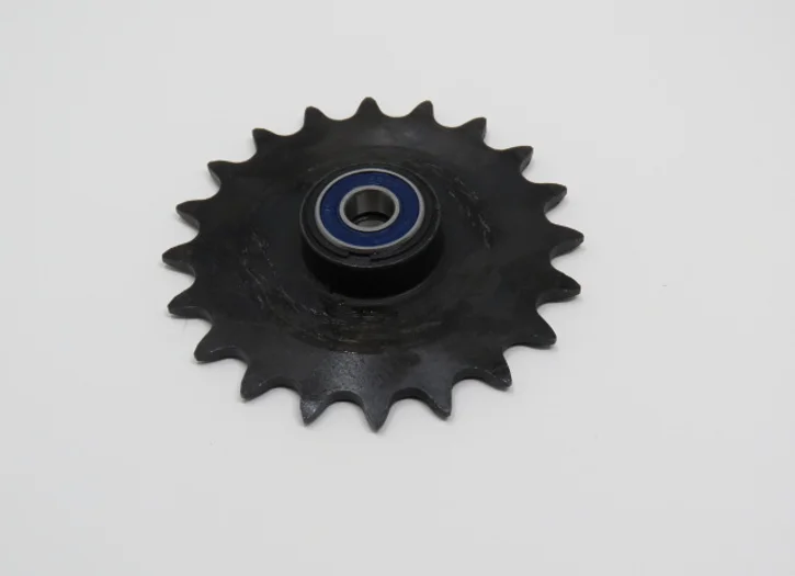 A black plastic wheel with a blue ring on top.